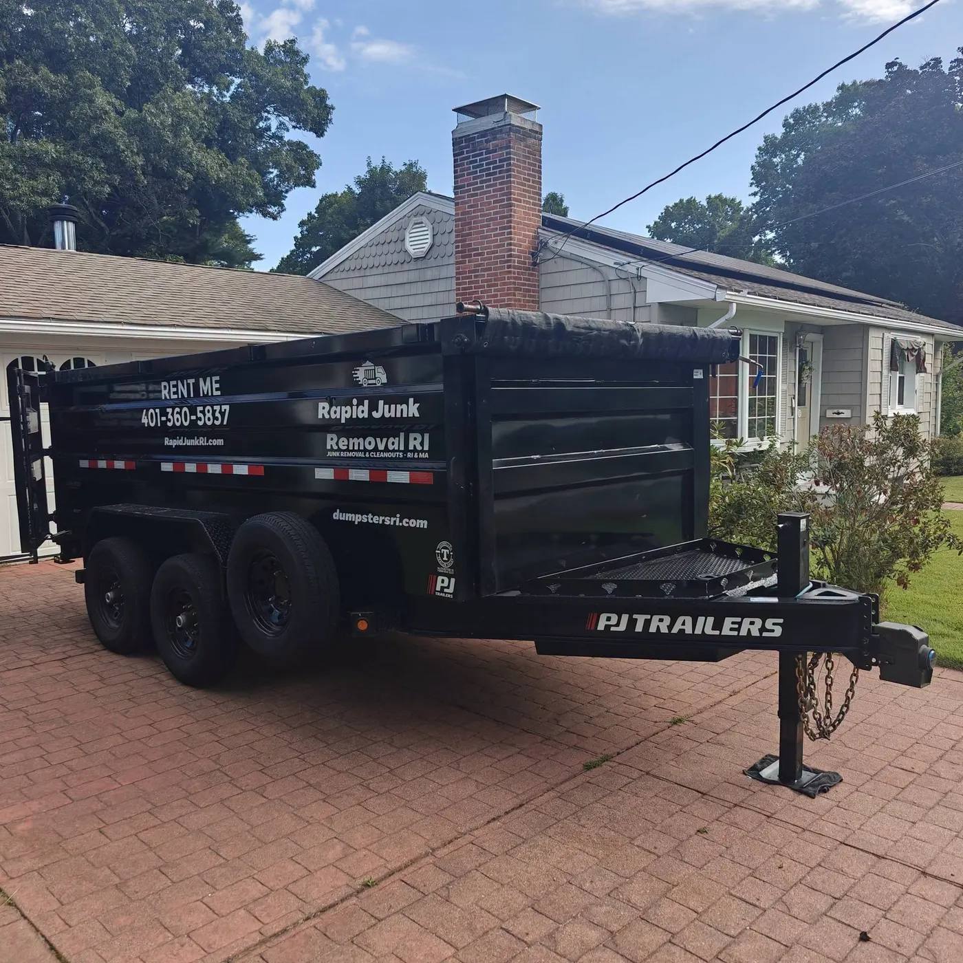 Driveway-friendly 15-yard dumpster rental delivered to a customer's home in Pawtucket, Rhode Island.